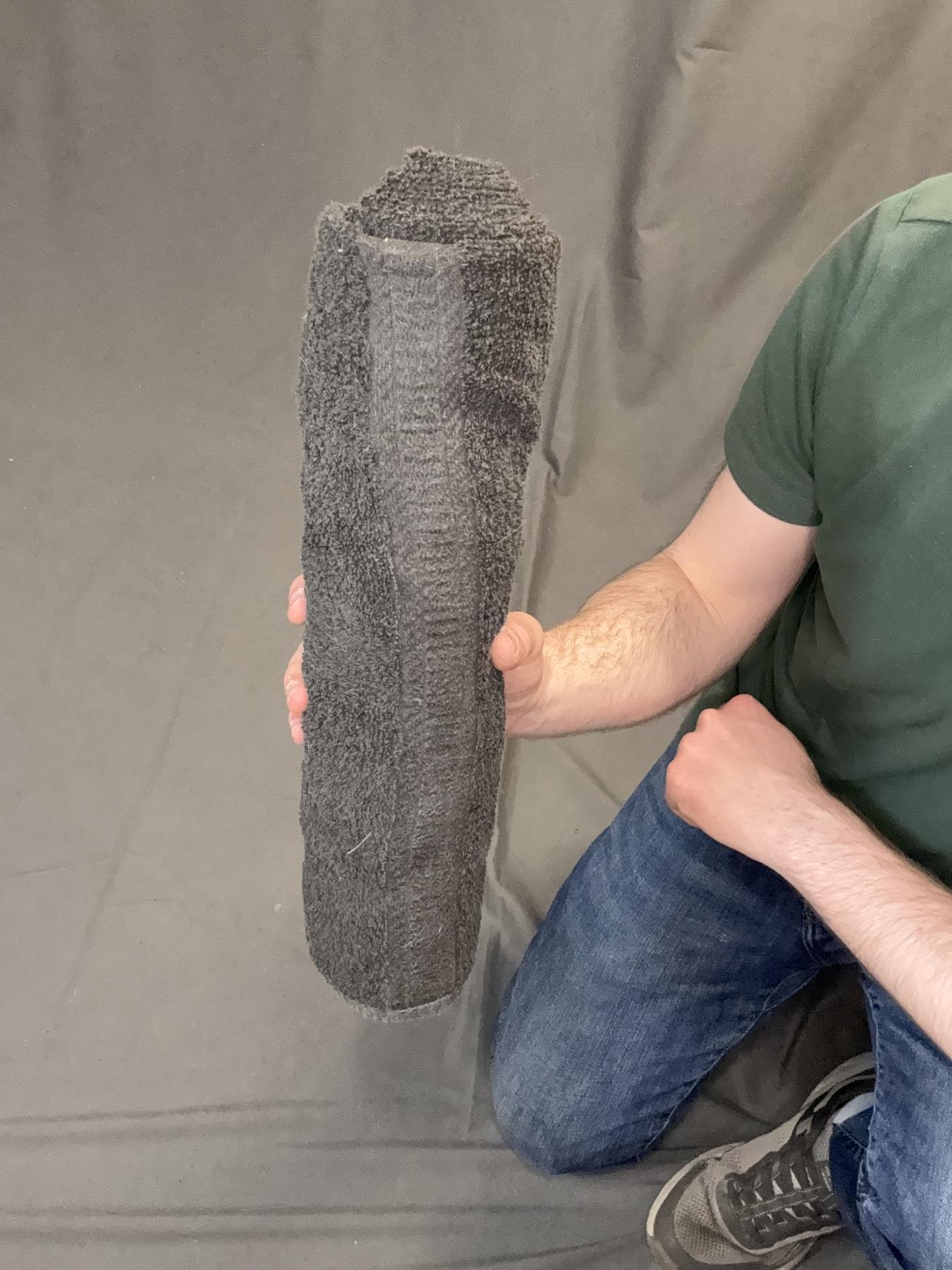 The completed tight towel roll before taping.