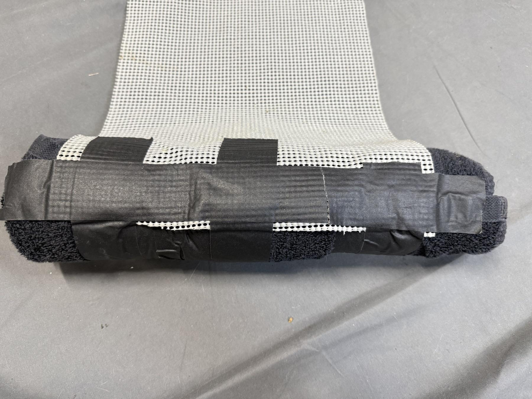 Close-up of cabinet liner taped to the TAM-BURRITO.