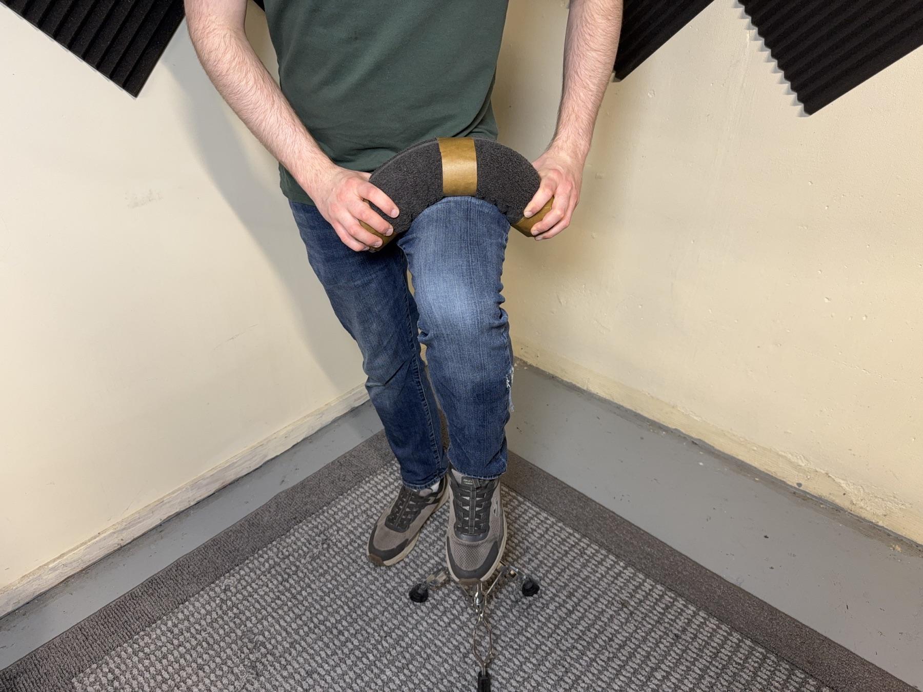 A TAM-BURRITO being bent to adjust its playing angle.